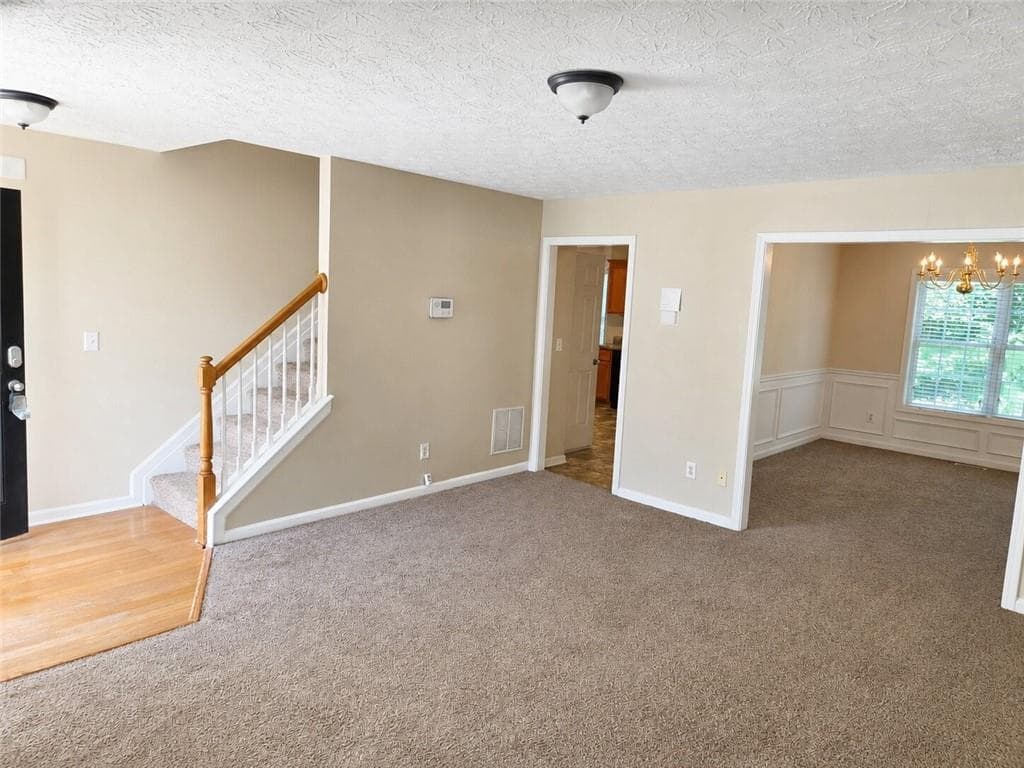 4 bedroom, 3 bathroom, 2,340 sq ft single family residence for sale at 1568 Pulaski Court, Suwanee, GA 30024 — photo 4