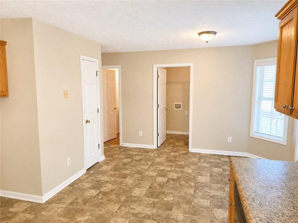 4 bedroom, 3 bathroom, 2,340 sq ft single family residence for sale at 1568 Pulaski Court, Suwanee, GA 30024 — photo 10
