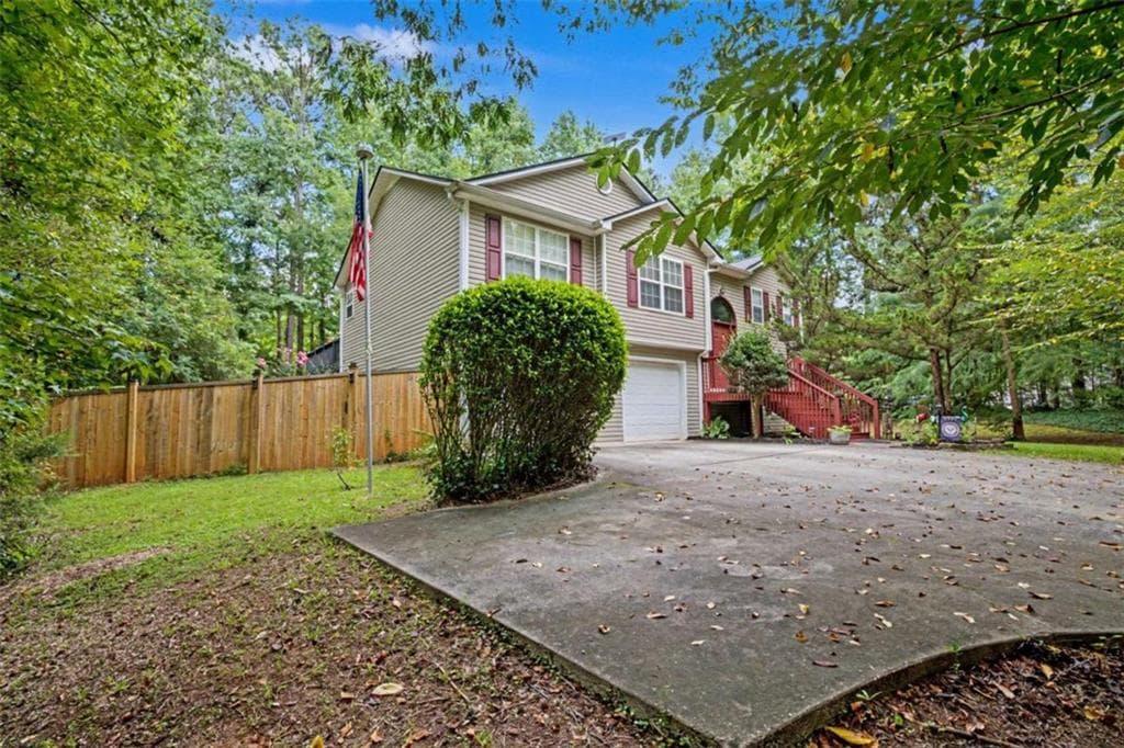 4 bedroom, 3 bathroom, 2,797 sq ft single family residence for sale at 1049 Millard Farmer Road, Newnan, GA 30263 — photo 2