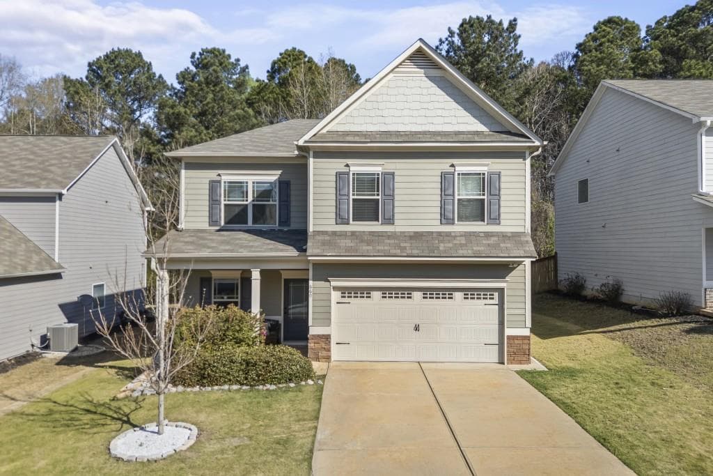 4 bedroom, 3 bathroom, 2,600 sq ft single family residence for sale at 660 Country Ridge Drive, Hoschton, GA 30548 — photo 1 of 58