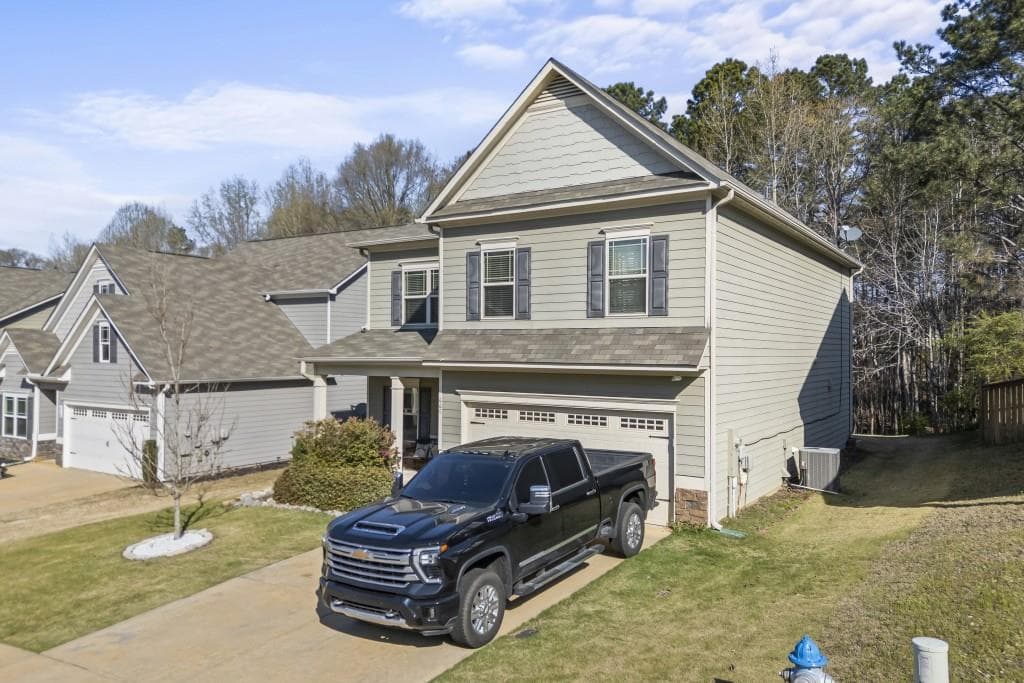 4 bedroom, 3 bathroom, 2,600 sq ft single family residence for sale at 660 Country Ridge Drive, Hoschton, GA 30548 — photo 4