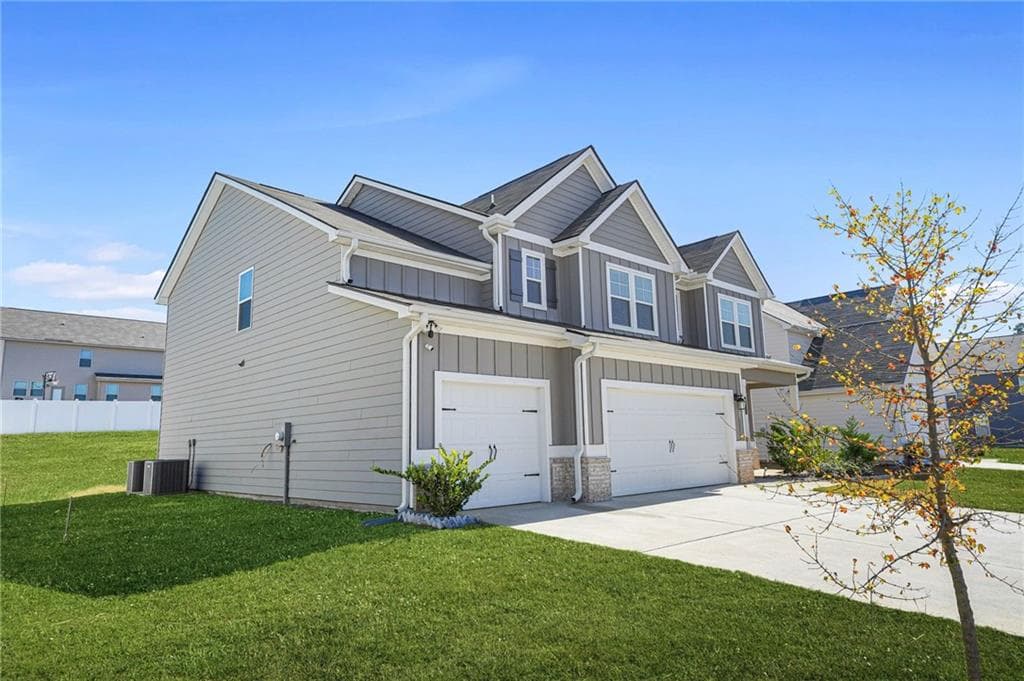 5 bedroom, 3 bathroom, 3,138 sq ft single family residence for sale at 1729 Cadence Street, Locust Grove, GA 30248 — photo 2