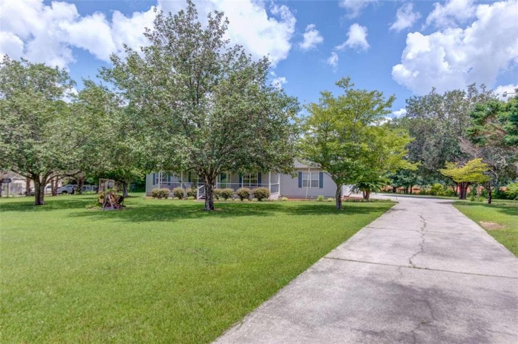3 bedroom, 2 bathroom, 1,489 sq ft single family residence for sale at 929 Ga Hwy 81, Loganville, GA 30052 — photo 2