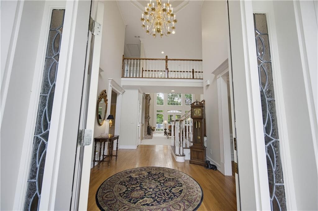 6 bedroom, 6 bathroom, 6,322 sq ft single family residence for sale at 5570 Stoneleigh Drive, Suwanee, GA 30024 — photo 3