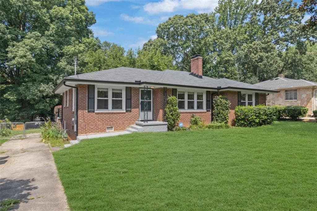 4 bedroom, 2 bathroom, 2,077 sq ft single family residence for sale at 1397 Downs Drive, Atlanta, GA 30311 — photo 2