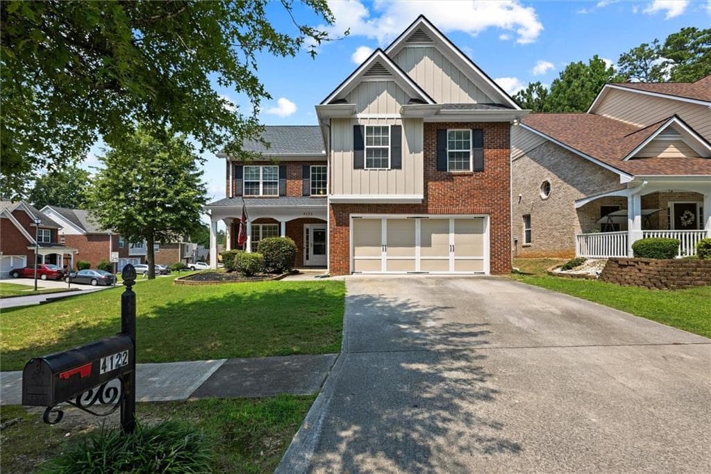4 bedroom, 3 bathroom, 2,648 sq ft single family residence for sale at 4122 Pond Edge Road, Snellville, GA 30039 — photo 2