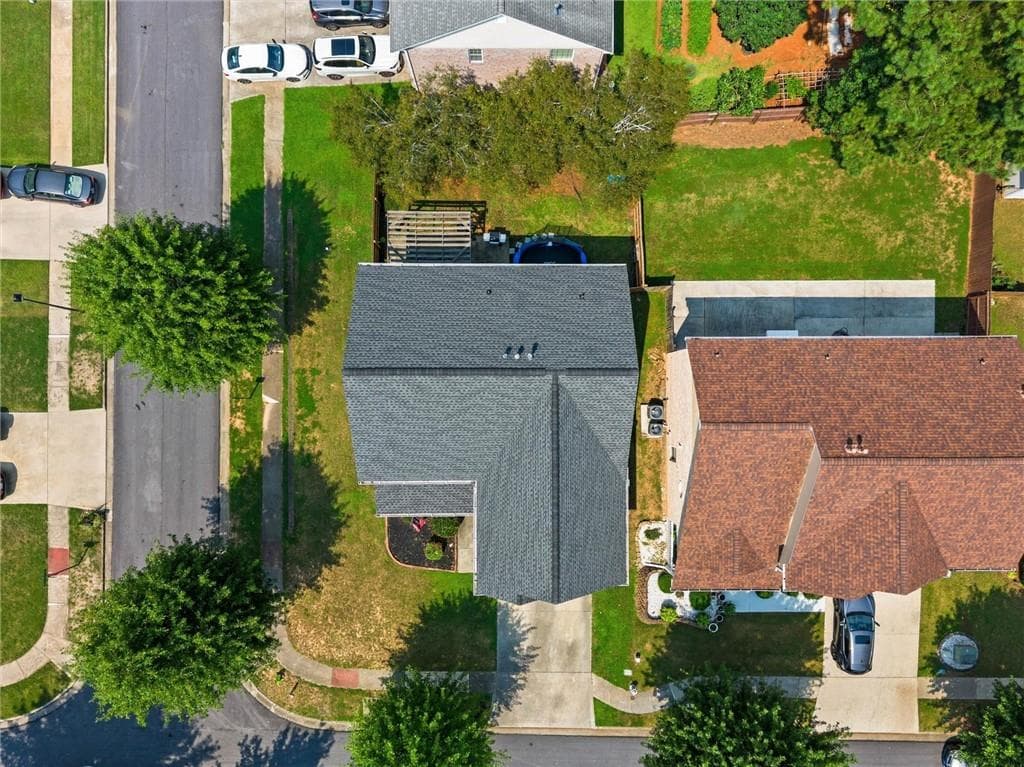 4 bedroom, 3 bathroom, 2,648 sq ft single family residence for sale at 4122 Pond Edge Road, Snellville, GA 30039 — photo 5