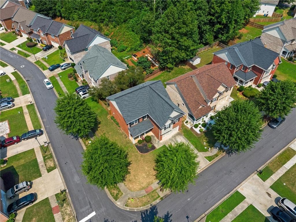 4 bedroom, 3 bathroom, 2,648 sq ft single family residence for sale at 4122 Pond Edge Road, Snellville, GA 30039 — photo 6