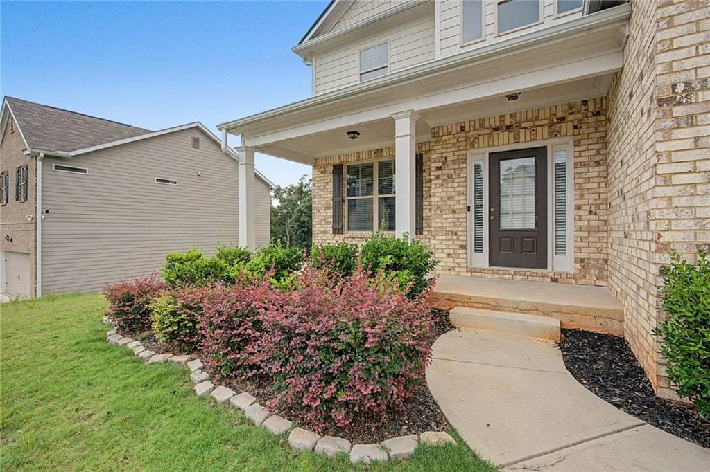 4 bedroom, 3 bathroom, 2,289 sq ft single family residence for sale at 5628 Woodland Greens Road, Douglasville, GA 30135 — photo 2