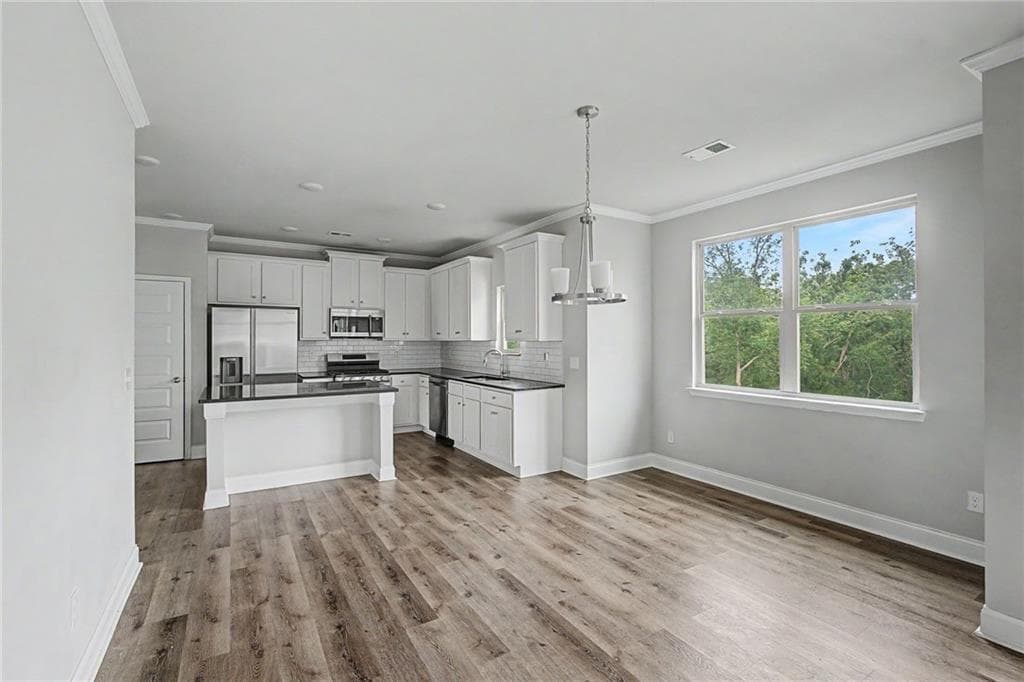 4 bedroom, 3 bathroom, 2,289 sq ft single family residence for sale at 5628 Woodland Greens Road, Douglasville, GA 30135 — photo 6