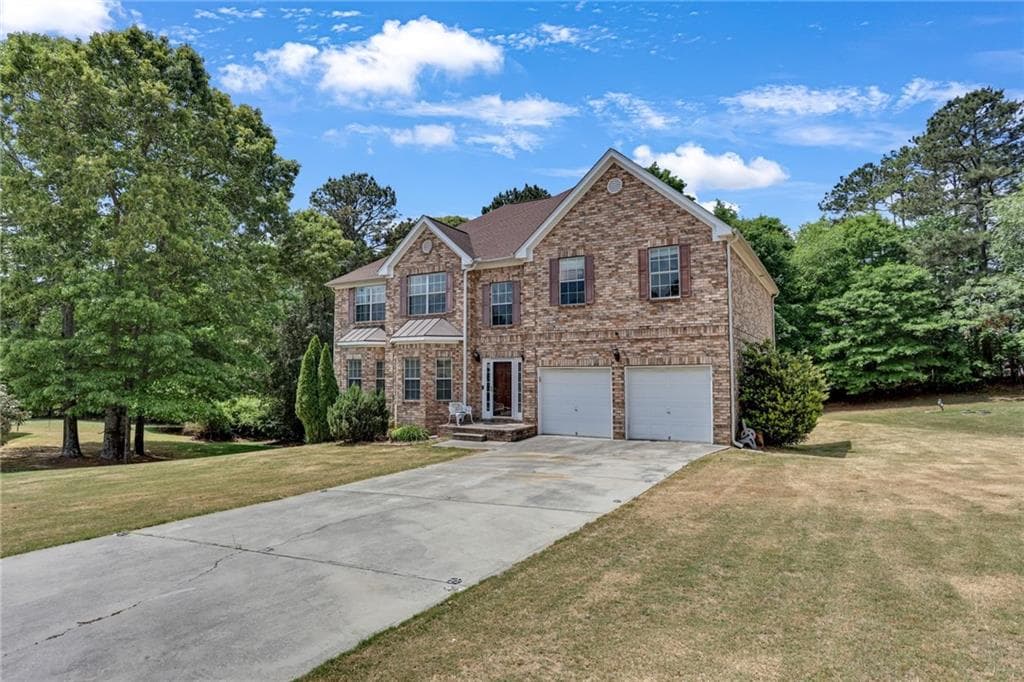6 bedroom, 5 bathroom, 5,775 sq ft single family residence for sale at 605 Harris Court, Conyers, GA 30012 — photo 2