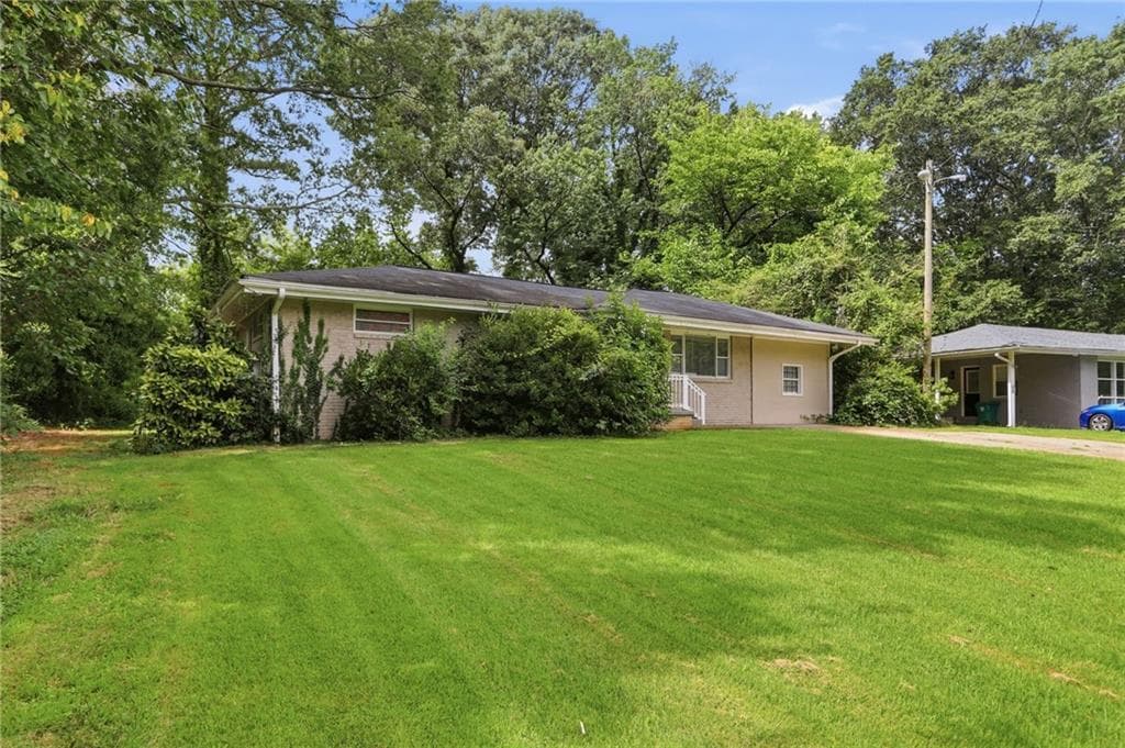 3 bedroom, 2 bathroom, 1,331 sq ft single family residence for sale at 2361 Collier Drive, Decatur, GA 30032 — photo 2