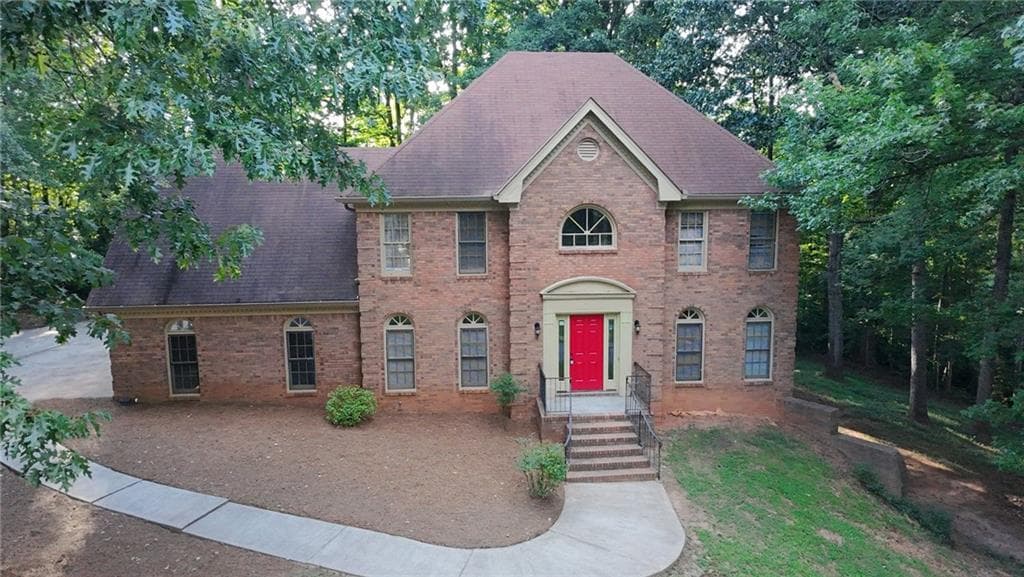5 bedroom, 3 bathroom, 3,822 sq ft single family residence for sale at 4290 Antelope Lane, Snellville, GA 30039 — photo 1 of 35