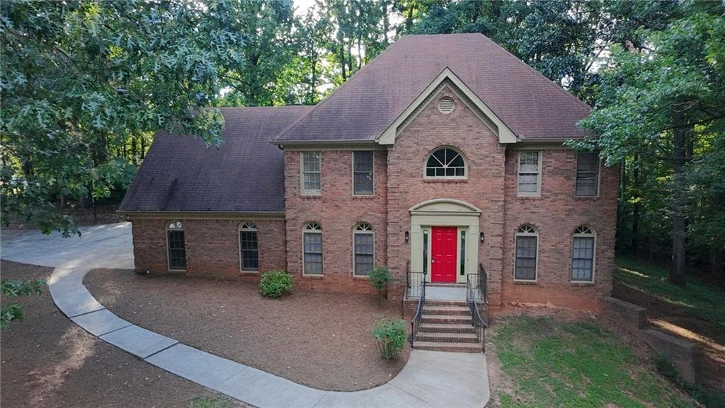 5 bedroom, 3 bathroom, 3,822 sq ft single family residence for sale at 4290 Antelope Lane, Snellville, GA 30039 — photo 2