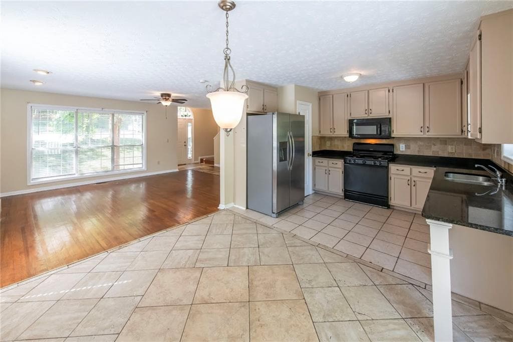 4 bedroom, 3 bathroom, 2,035 sq ft single family residence for sale at 5995 Megcole Way, Mableton, GA 30126 — photo 4