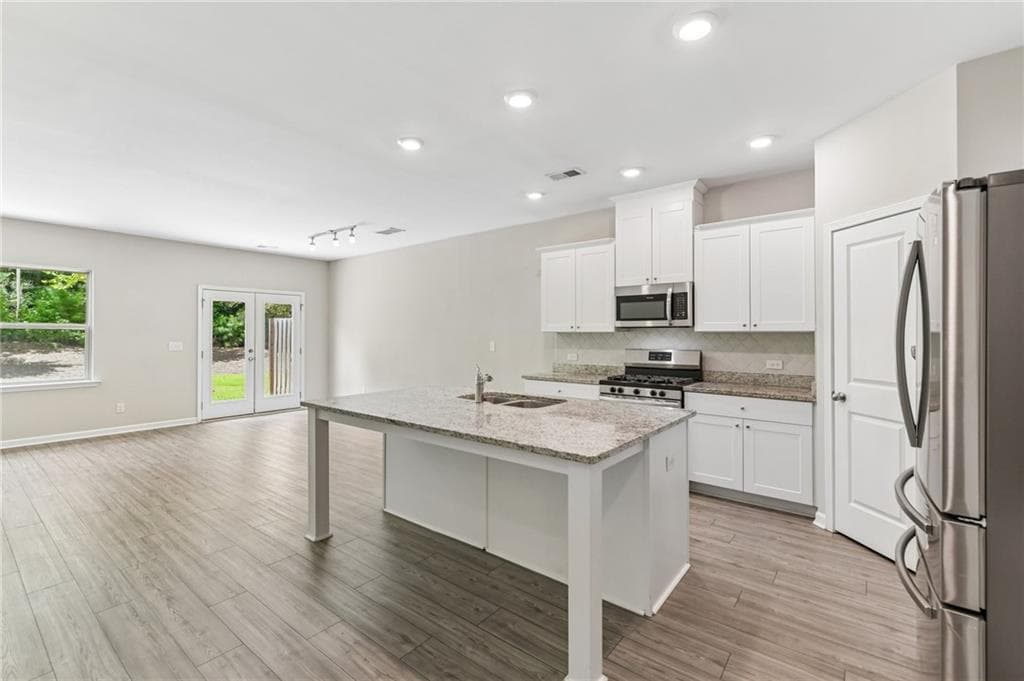 3 bedroom, 3 bathroom, 1,874 sq ft townhouse for sale at 6032 Harbor Landing Drive, Buford, GA 30518 — photo 2