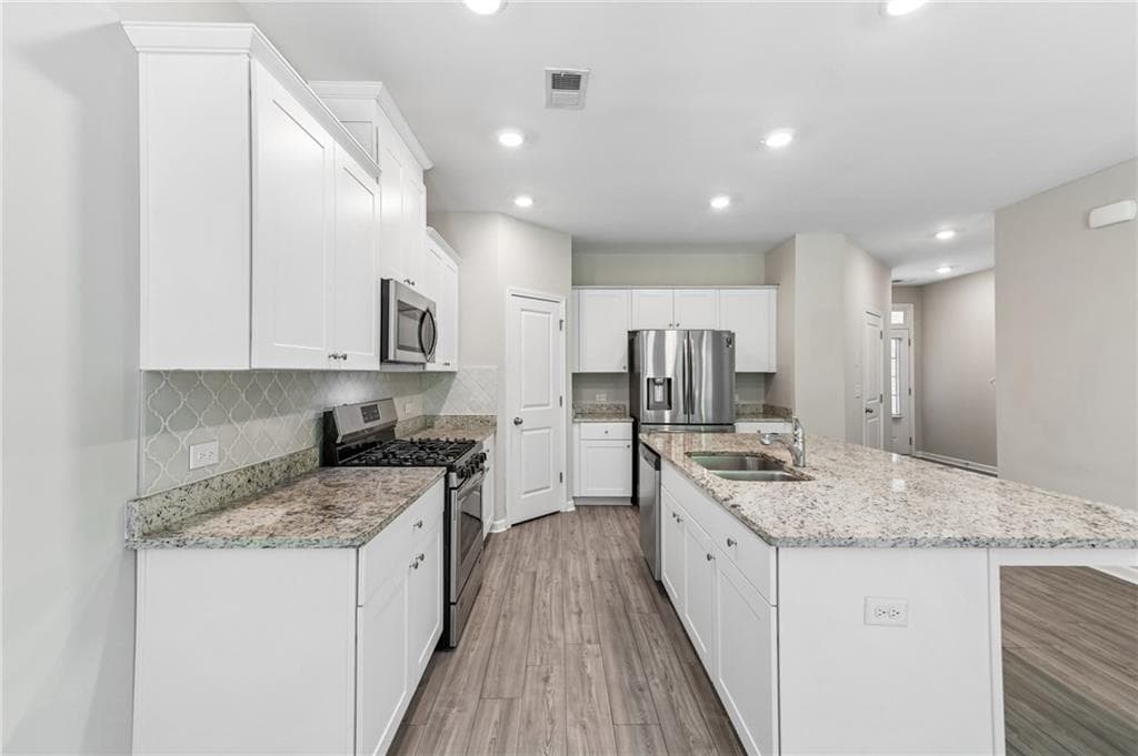 3 bedroom, 3 bathroom, 1,874 sq ft townhouse for sale at 6032 Harbor Landing Drive, Buford, GA 30518 — photo 3