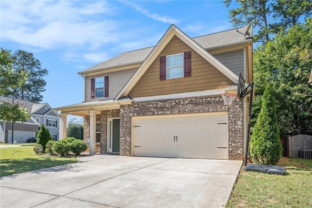 4 bedroom, 3 bathroom, 2,454 sq ft single family residence for sale at 2613 Kolb Manor Circle, Marietta, GA 30008 — photo 2