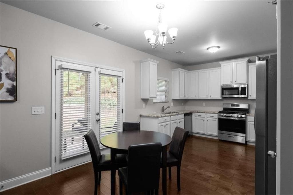 4 bedroom, 3 bathroom, 2,102 sq ft single family residence for sale at 4142 Woodland Park Drive, Atlanta, GA 30331 — photo 8