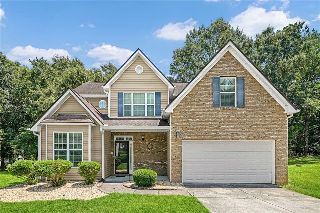4 bedroom, 3 bathroom, 2,086 sq ft single family residence for sale at 2432 Temple View Drive, Snellville, GA 30078 — photo 1 of 52