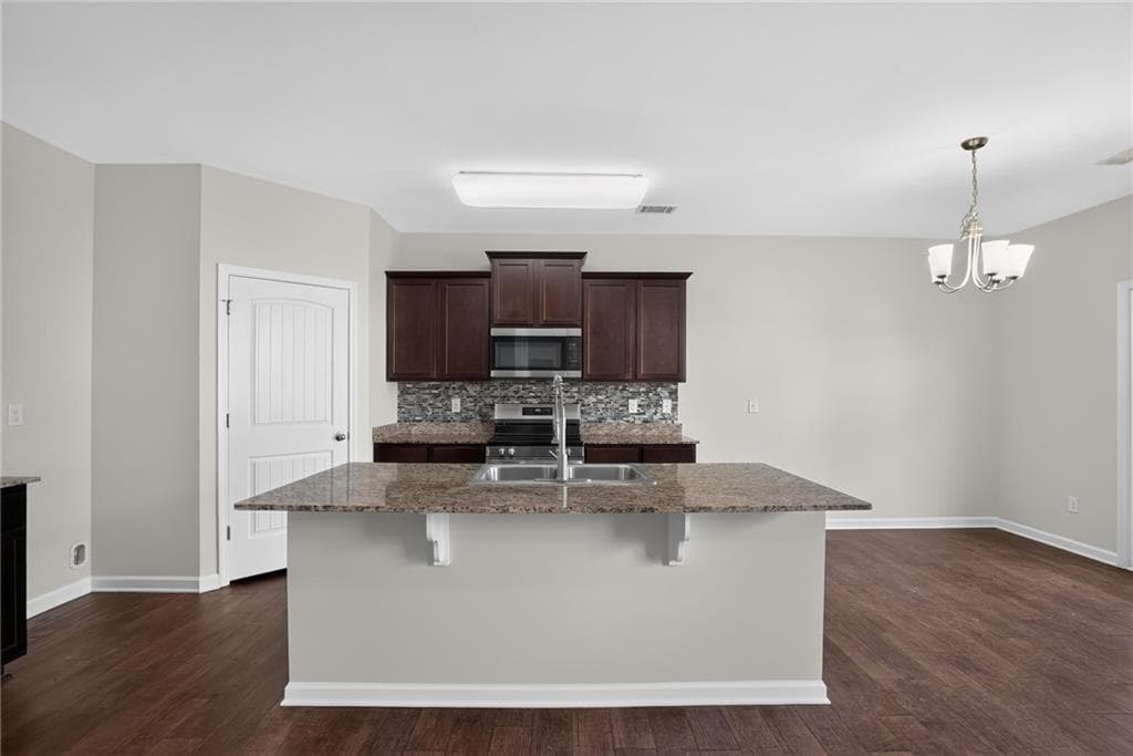 5 bedroom, 3 bathroom, 3,044 sq ft single family residence under contract at 1961 Osprey Drive, Hampton, GA 30228 — photo 6