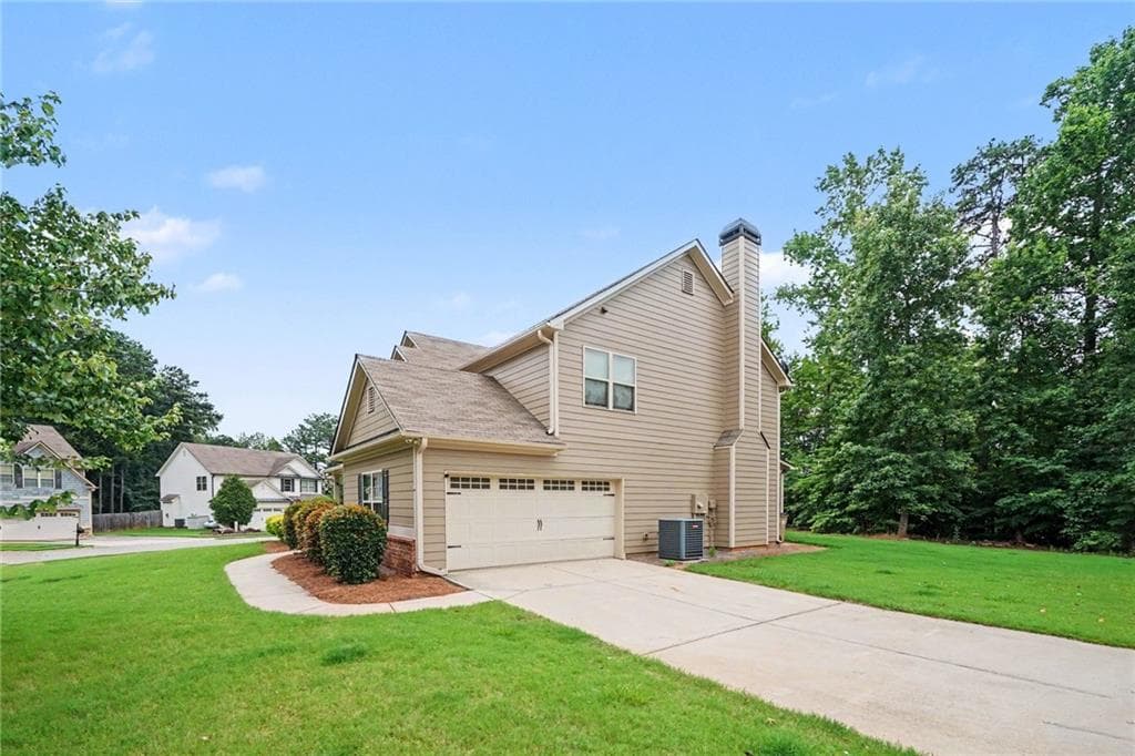 4 bedroom, 3 bathroom, 2,393 sq ft single family residence for sale at 611 Little Bluestem Trail, Hoschton, GA 30548 — photo 5