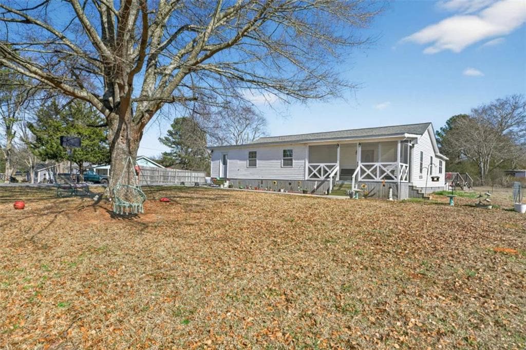 4 bedroom, 2 bathroom, 1,880 sq ft single family residence for sale at 507 Grogan Road, Buchanan, GA 30113 — photo 2