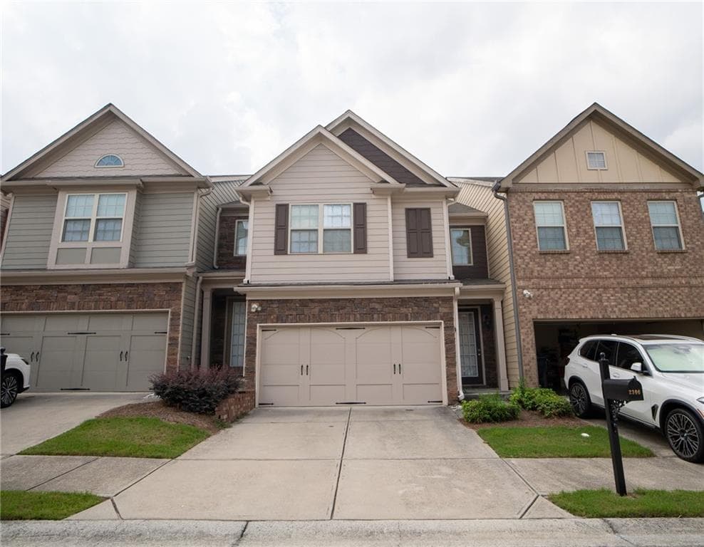 3 bedroom, 3 bathroom, 1,969 sq ft townhouse for sale at 2306 Bellyard Drive, Buford, GA 30519 — photo 1 of 25