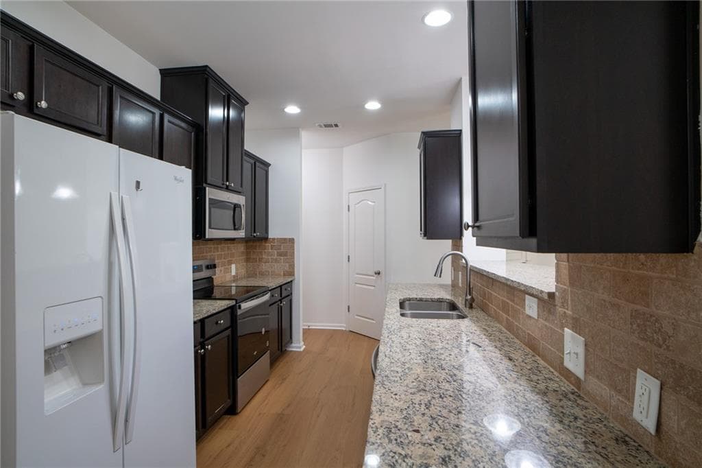 3 bedroom, 3 bathroom, 1,969 sq ft townhouse for sale at 2306 Bellyard Drive, Buford, GA 30519 — photo 7