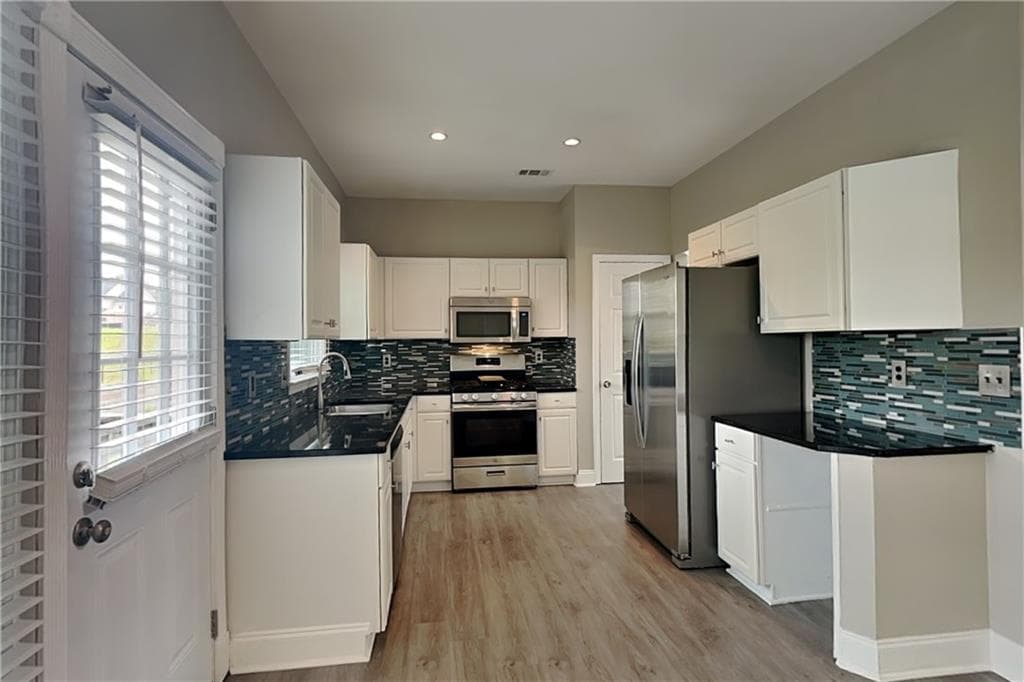 4 bedroom, 3 bathroom, 2,578 sq ft single family residence for rent at 1461 Rosewood Creek Drive, Marietta, GA 30066 for $2,745 a month — photo 3