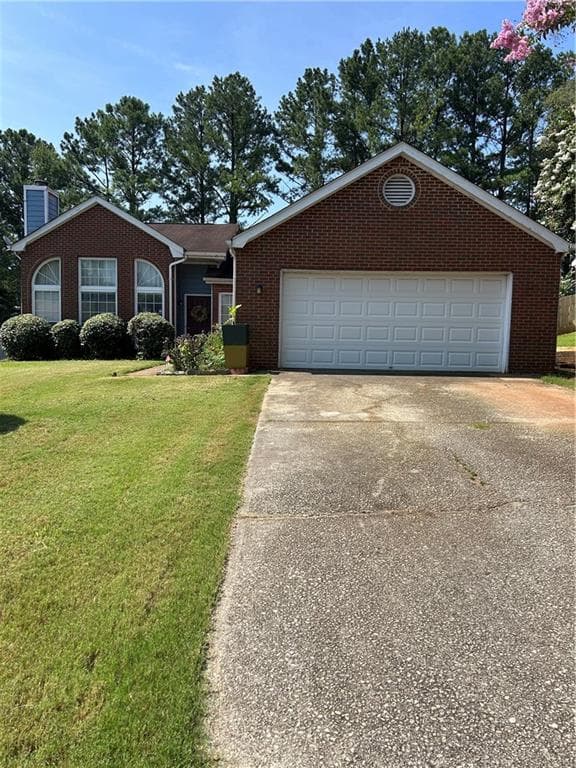 4 bedroom, 2 bathroom, 1,687 sq ft single family residence for sale at 1470 Charter Oaks Lane, Lawrenceville, GA 30046 — photo 3