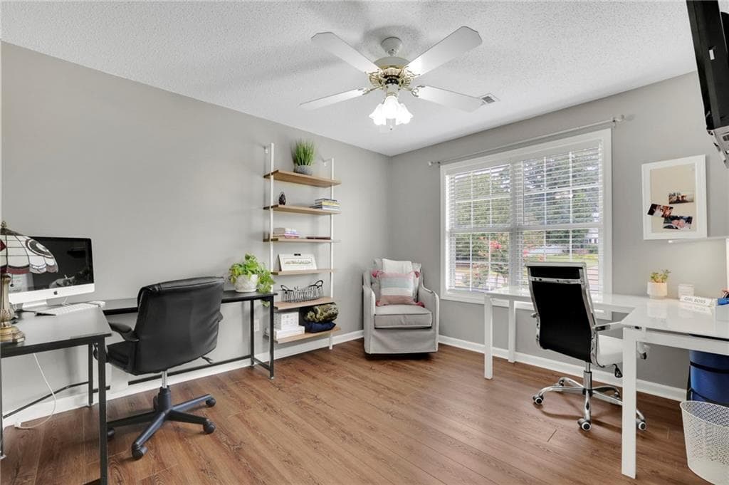 4 bedroom, 3 bathroom, 1,860 sq ft single family residence for sale at 7660 Streamside Lane, Cumming, GA 30028 — photo 8