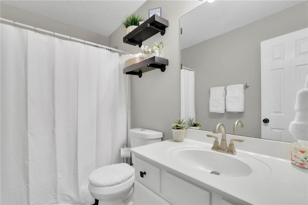 4 bedroom, 3 bathroom, 1,860 sq ft single family residence for sale at 7660 Streamside Lane, Cumming, GA 30028 — photo 10