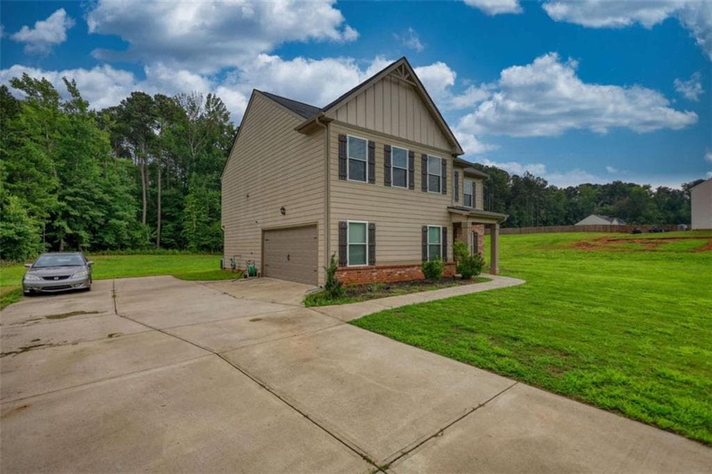4 bedroom, 3 bathroom, 2,427 sq ft single family residence for sale at 95 Bridgemill Drive, Covington, GA 30014 — photo 2