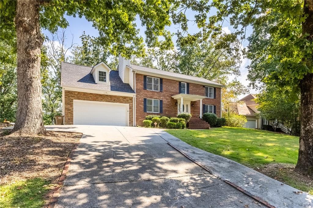 4 bedroom, 3 bathroom, 5,152 sq ft single family residence for sale at 2527 Venture Circle, Gainesville, GA 30506 — photo 2