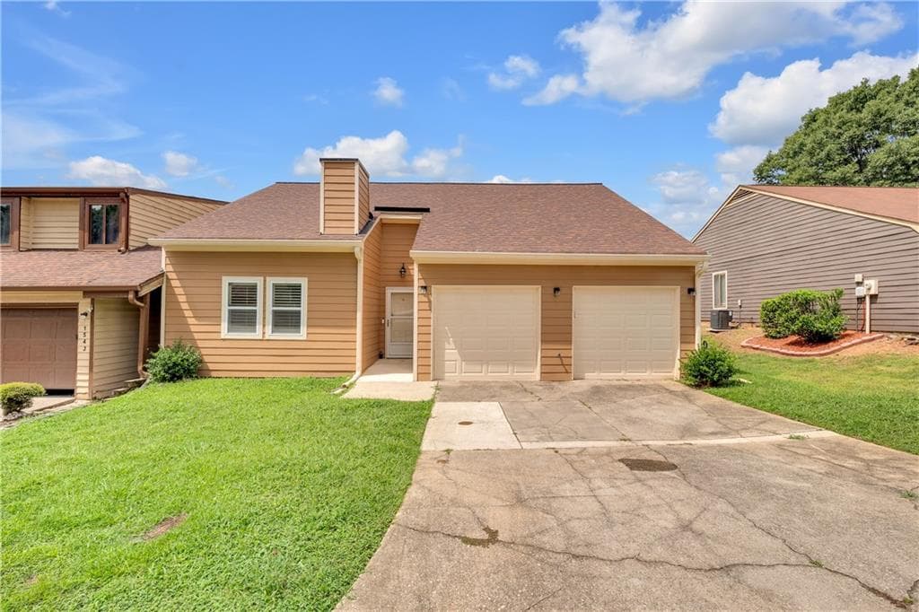 3 bedroom, 2 bathroom, 1,334 sq ft townhouse for sale at 1541 Burnstone Drive, Stone Mountain, GA 30088