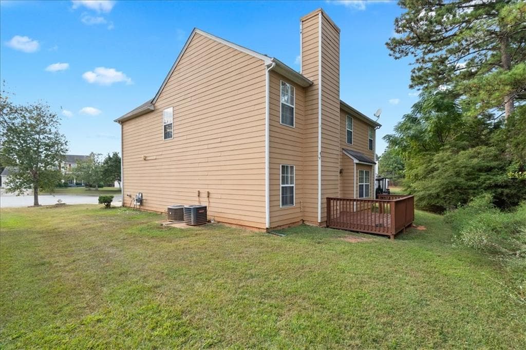 4 bedroom, 3 bathroom, 2,016 sq ft single family residence for sale at 2628 ESSEX Court, Conyers, GA 30013 — photo 2