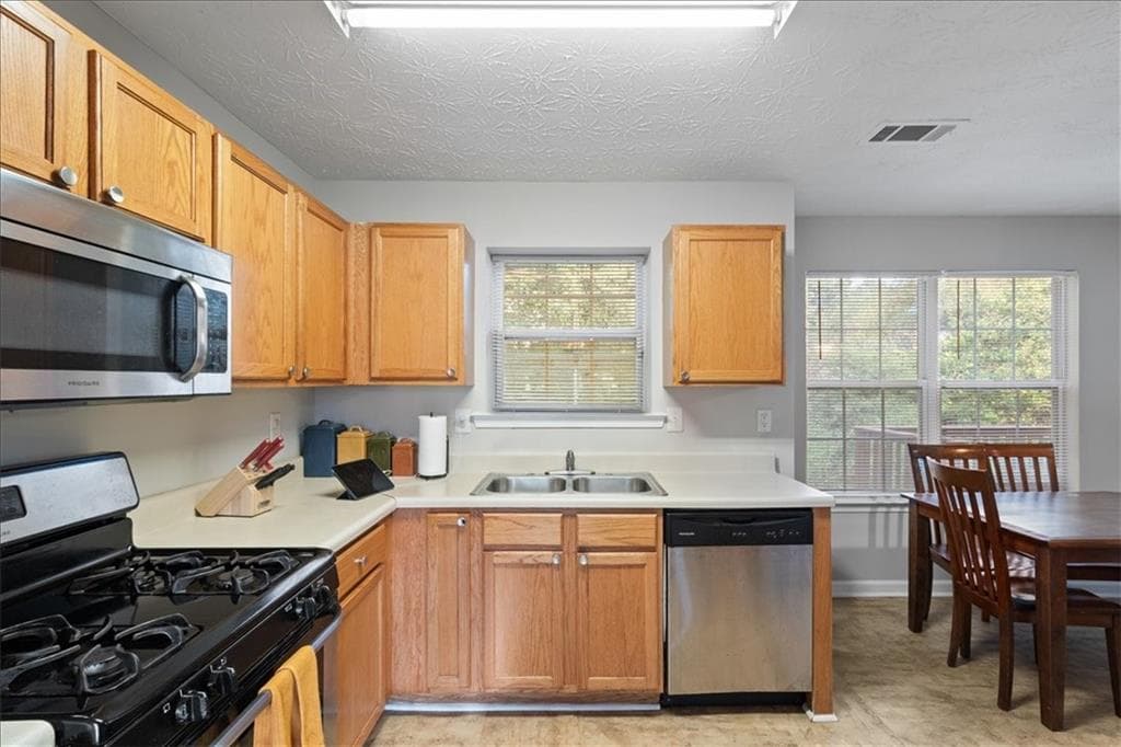 4 bedroom, 3 bathroom, 2,016 sq ft single family residence for sale at 2628 ESSEX Court, Conyers, GA 30013 — photo 5