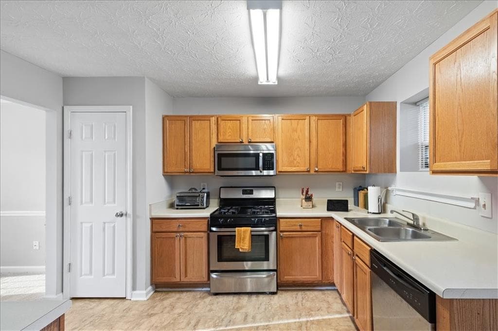 4 bedroom, 3 bathroom, 2,016 sq ft single family residence for sale at 2628 ESSEX Court, Conyers, GA 30013 — photo 6
