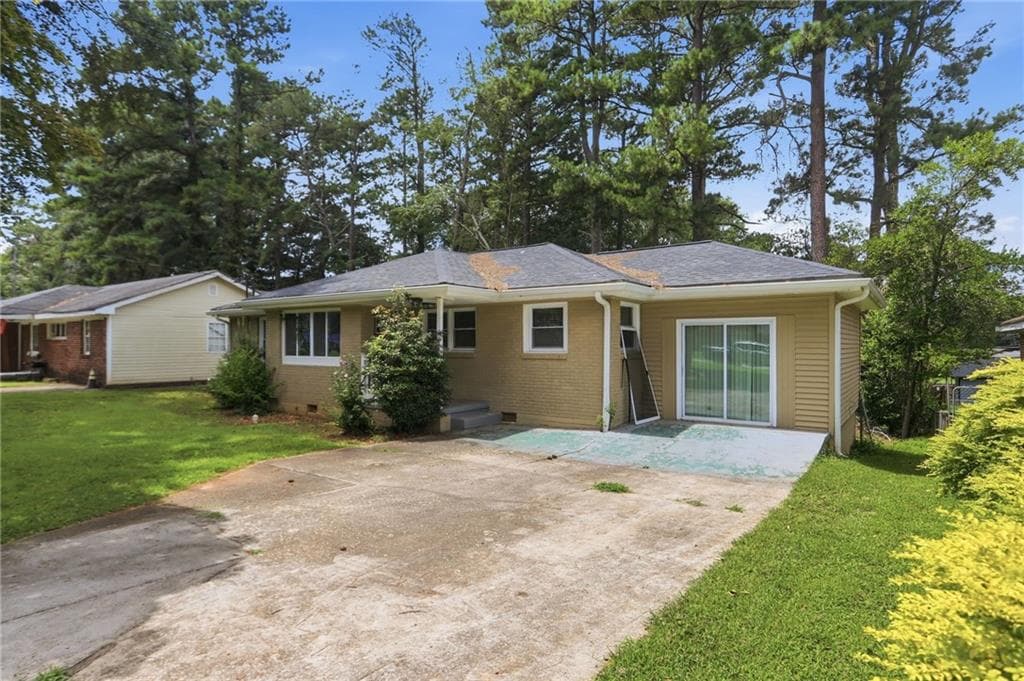 3 bedroom, 2 bathroom, 1,413 sq ft single family residence for sale at 1089 Canal Street, Decatur, GA 30032 — photo 2