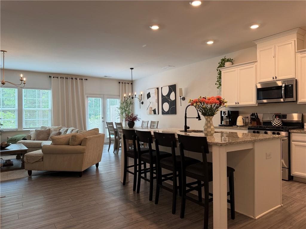 3 bedroom, 3 bathroom, 1,949 sq ft townhouse for sale at 3046 Stockholm Way, Suwanee, GA 30024 — photo 5