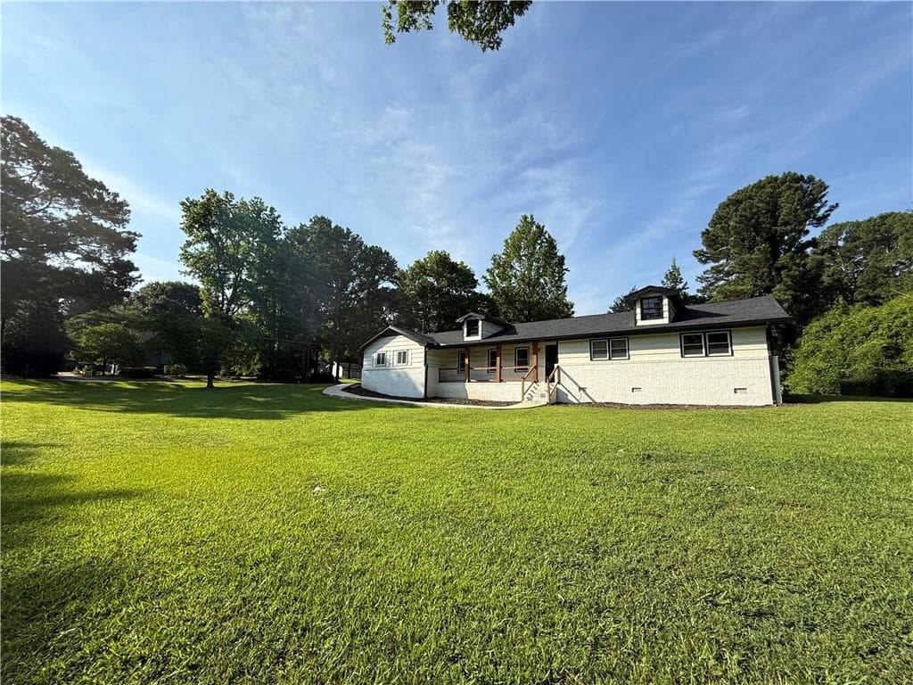3 bedroom, 2 bathroom, 1,700 sq ft single family residence for sale at 201 Lockring Drive, Lilburn, GA 30047 — photo 2