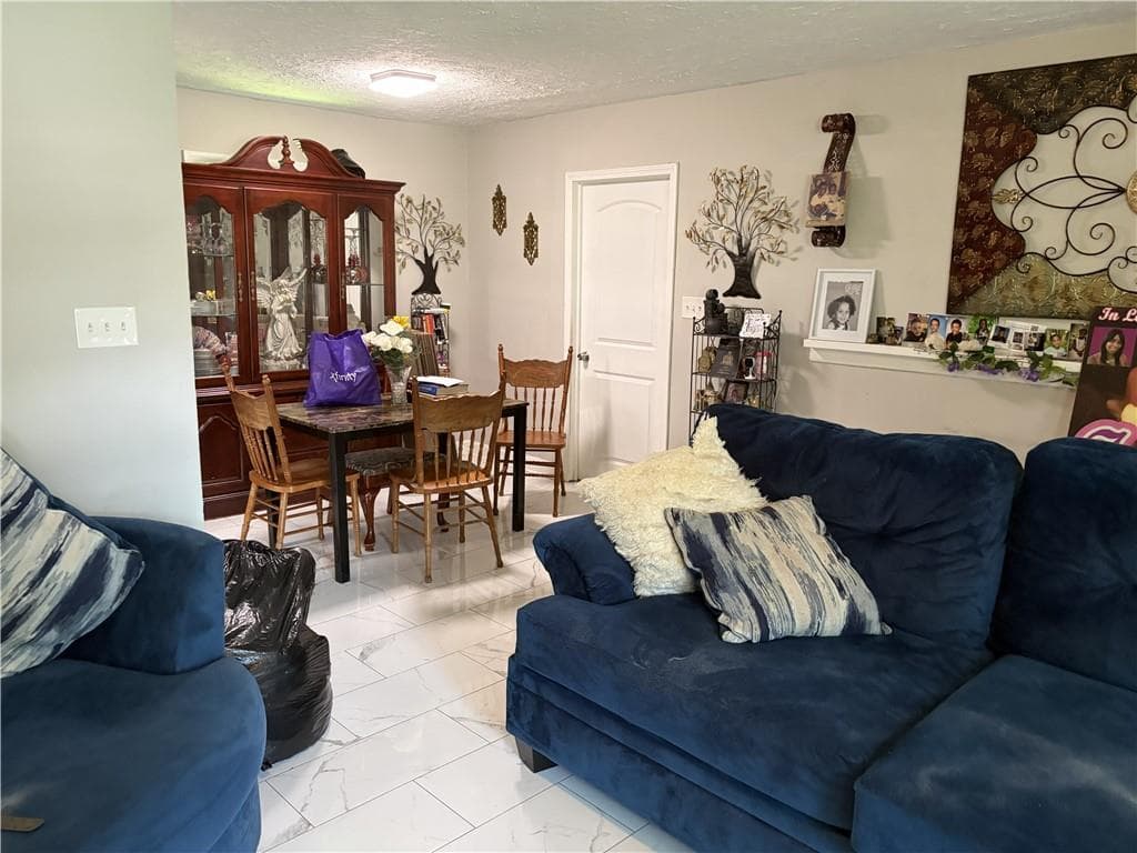 4 bedroom, 2 bathroom, 1,144 sq ft single family residence for sale at 2680 Wiggins Street, Lithonia, GA 30058 — photo 6
