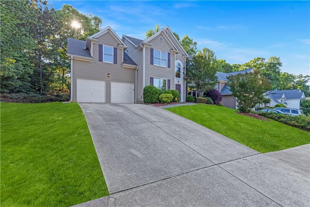 4 bedroom, 3 bathroom, 2,376 sq ft single family residence for sale at 4310 canterbury walk Drive, Duluth, GA 30097 — photo 2