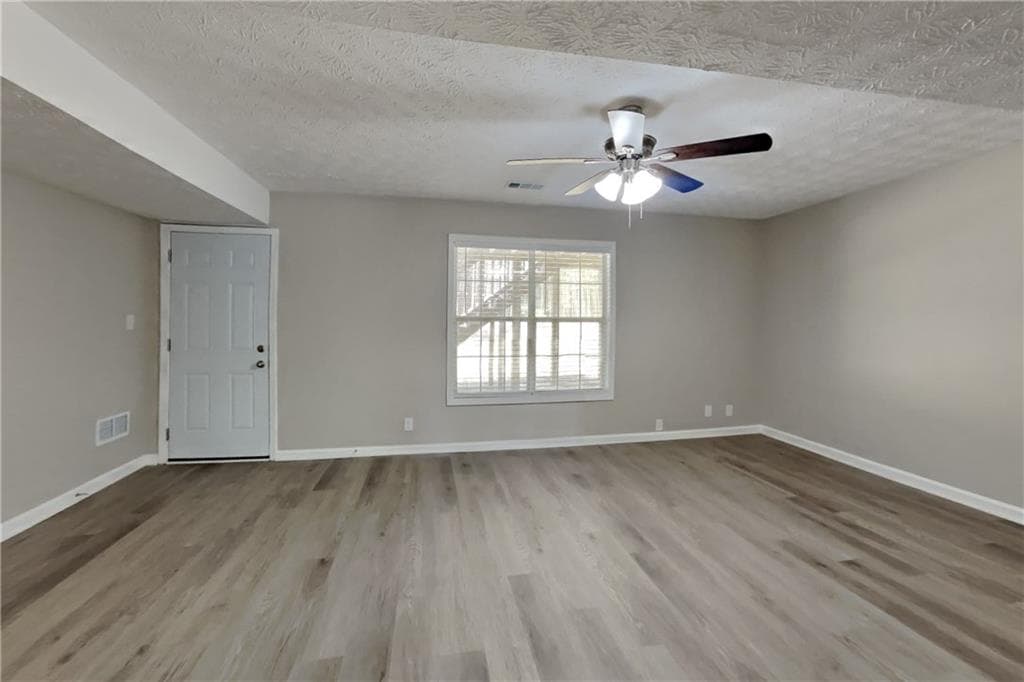 4 bedroom, 3 bathroom, 2,036 sq ft single family residence for rent at 5660 Windswept Trace, Sugar Hill, GA 30518 for $2,275 a month — photo 3