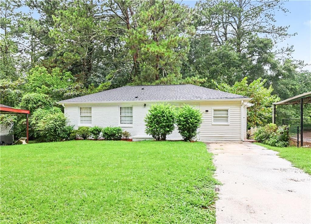 3 bedroom, 2 bathroom, 1,032 sq ft single family residence for sale at 2823 Marco Drive, Atlanta, GA 30318 — photo 1 of 28