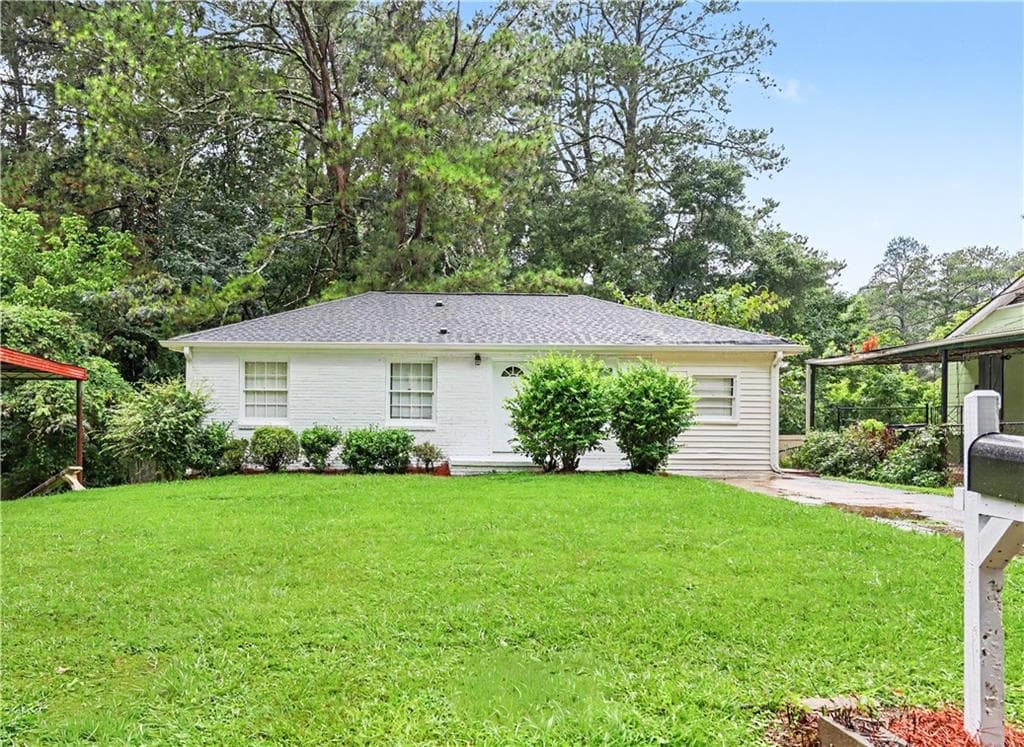 3 bedroom, 2 bathroom, 1,032 sq ft single family residence for sale at 2823 Marco Drive, Atlanta, GA 30318 — photo 2