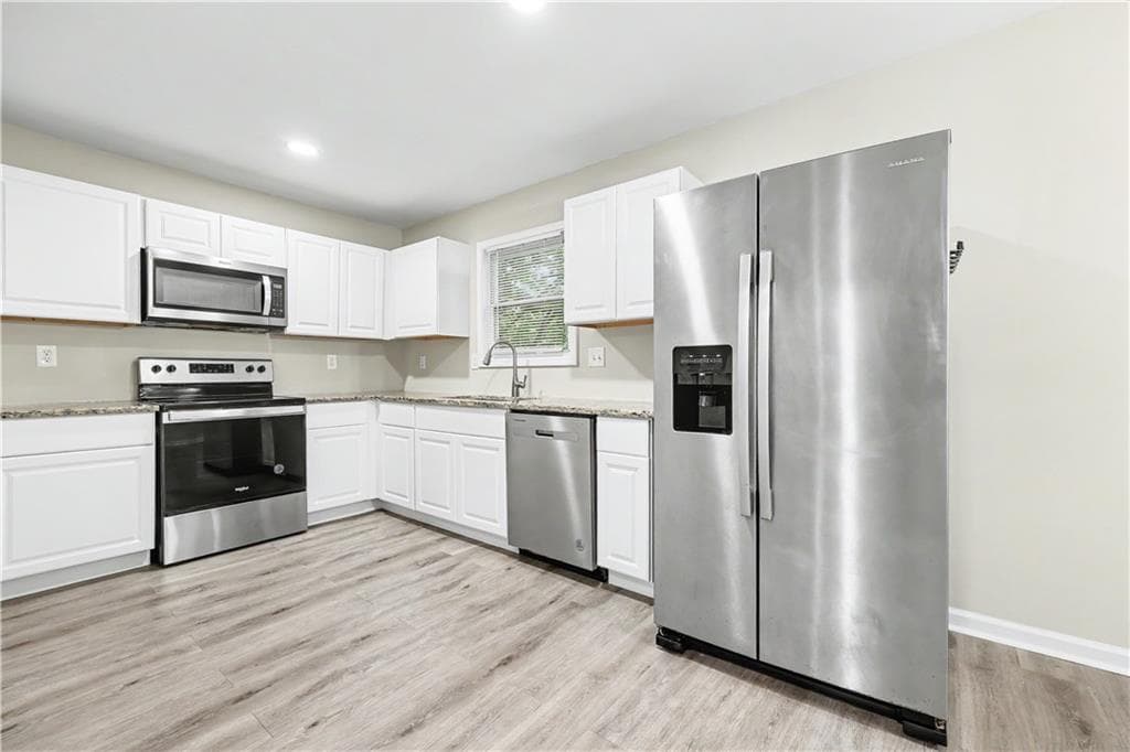 3 bedroom, 2 bathroom, 1,032 sq ft single family residence for sale at 2823 Marco Drive, Atlanta, GA 30318 — photo 6