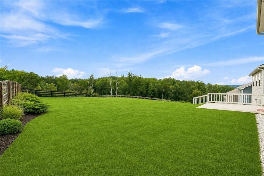 5 bedroom, 3 bathroom, 2,572 sq ft single family residence for sale at 6890 Scarlet Oak Way, Flowery Branch, GA 30542 — photo 2