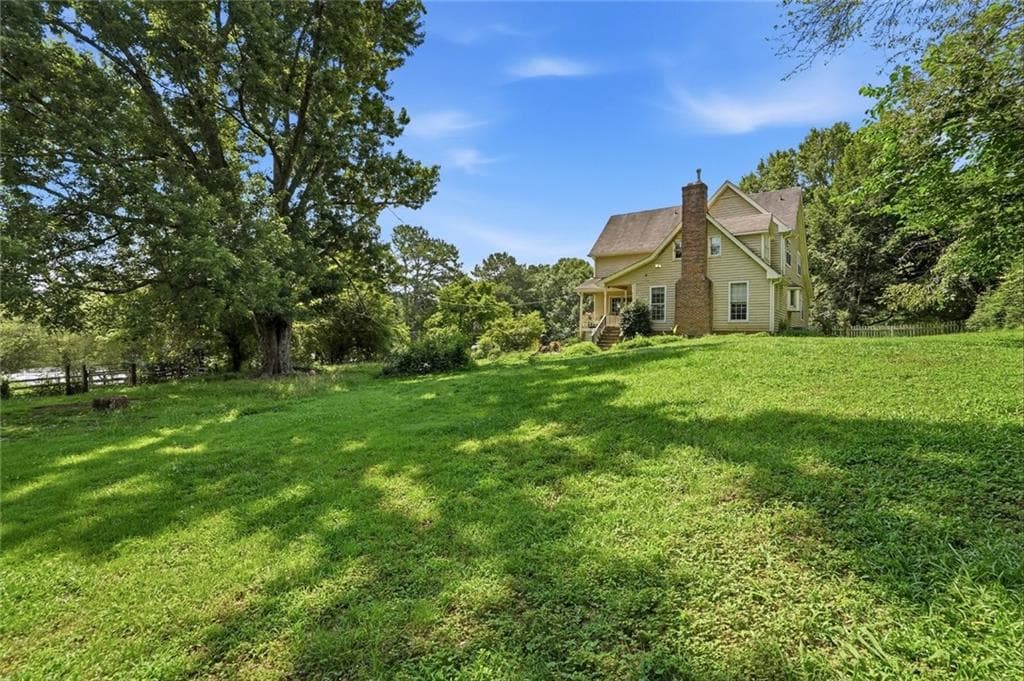 4 bedroom, 3 bathroom single family residence for sale at 1900 Redd Road, Milton, GA 30004